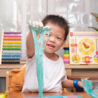 child playing with slime