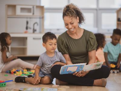 Teacher reading to a child