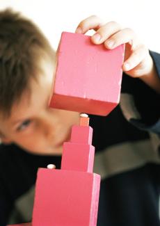 boy playing with blocks