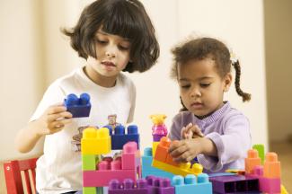 children playing with building blocks