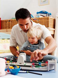 dad and kid playing