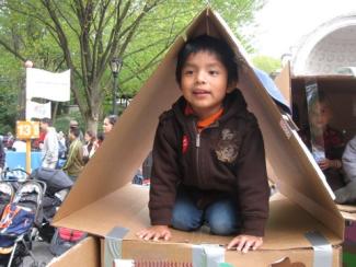 child playing in box