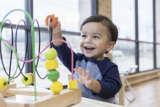 child playing with toy